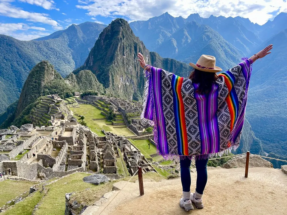 Traveler enjoying the classic panoramic view of Machu Picchu on Circuit 1 in 2026