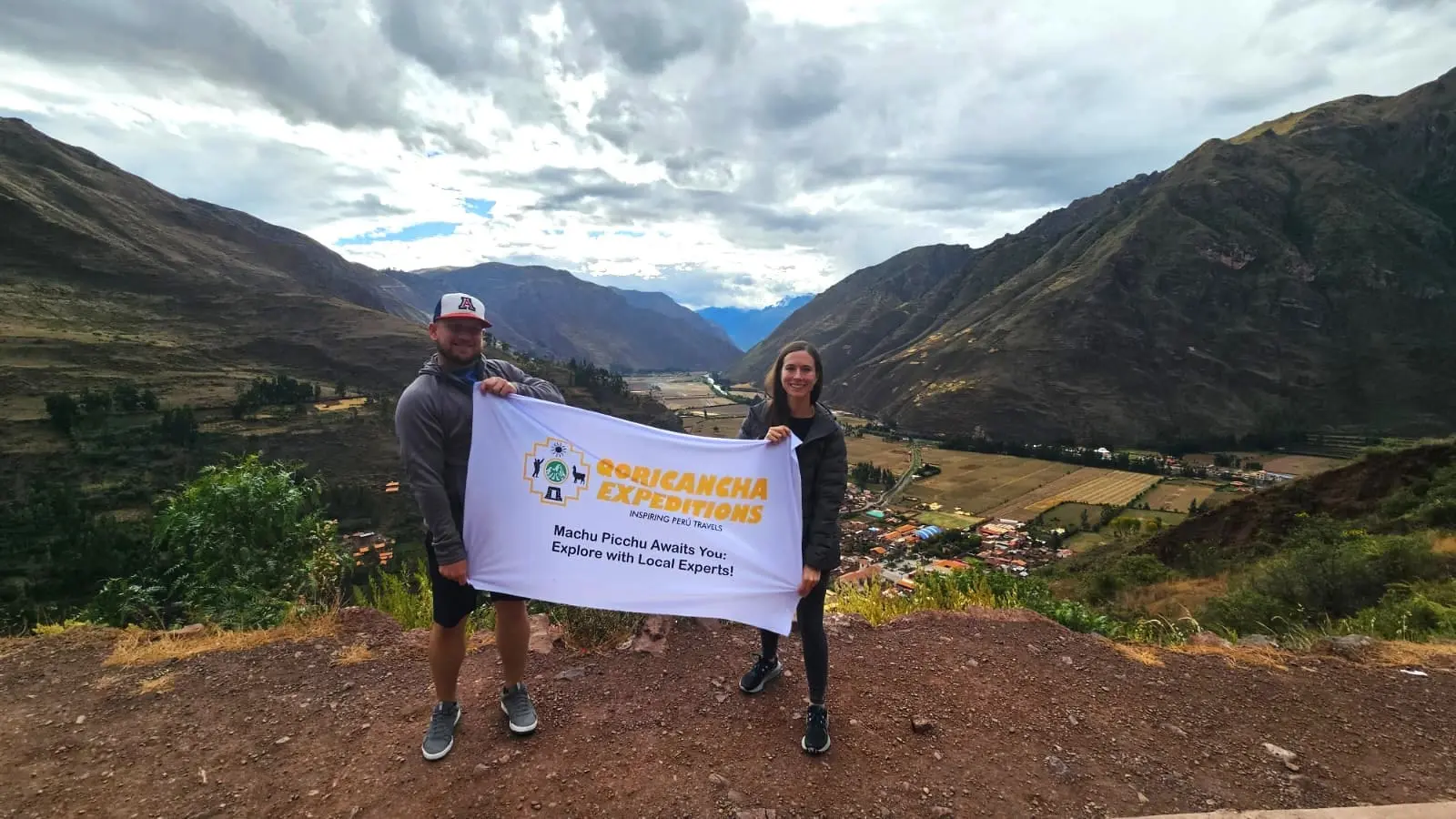 Travelers enjoying the panoramic views of the Sacred Valley