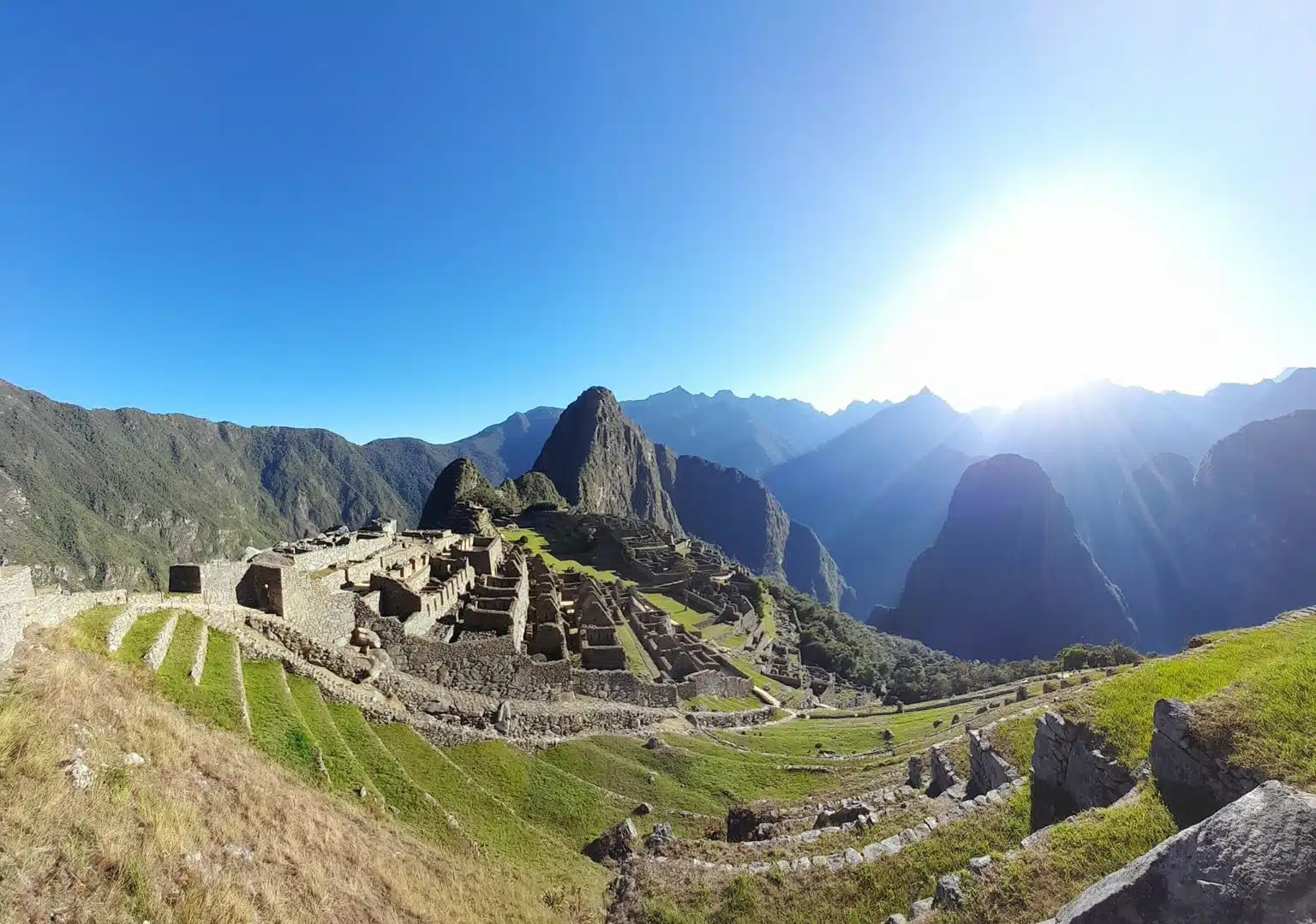 Golden sunrise views over Machu Picchu citadel